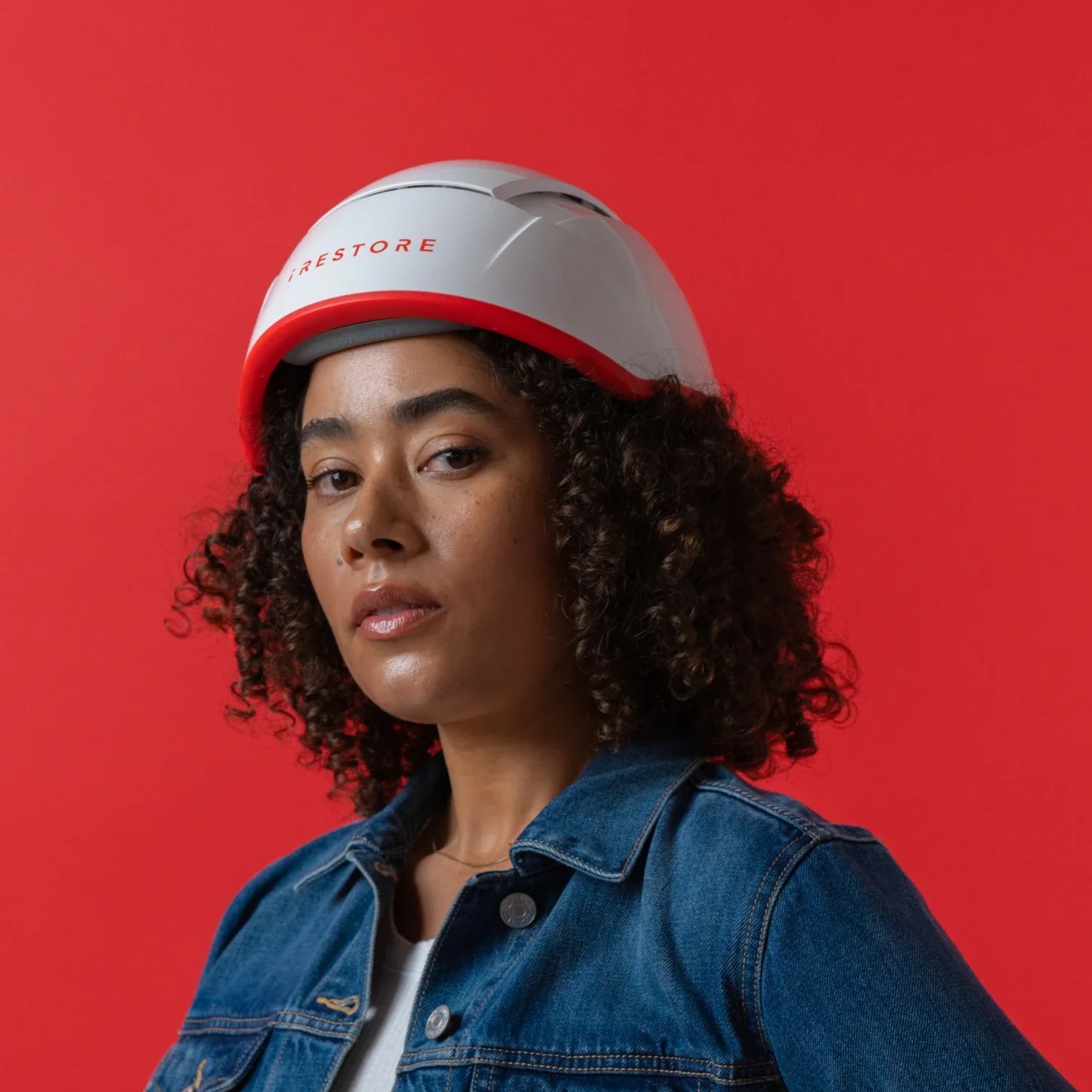 Image of a middle aged woman wearing the Professional hair device.